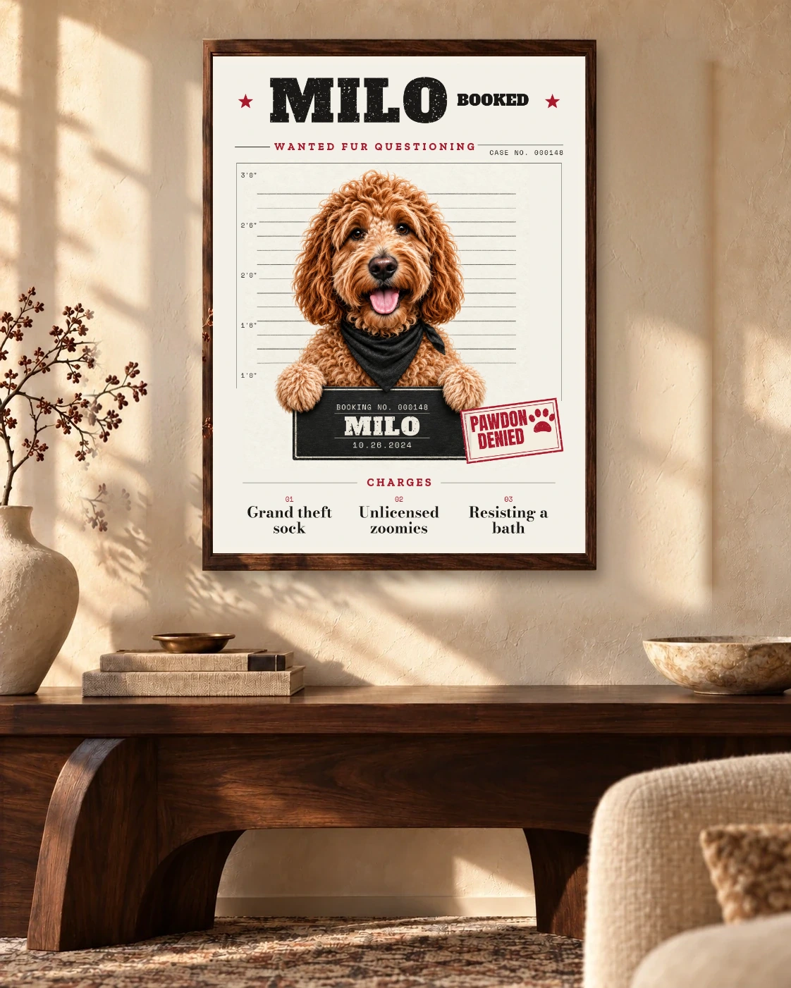 Milo’s PAWDON DENIED booking poster fitted inside a wooden frame in a sunlit living room